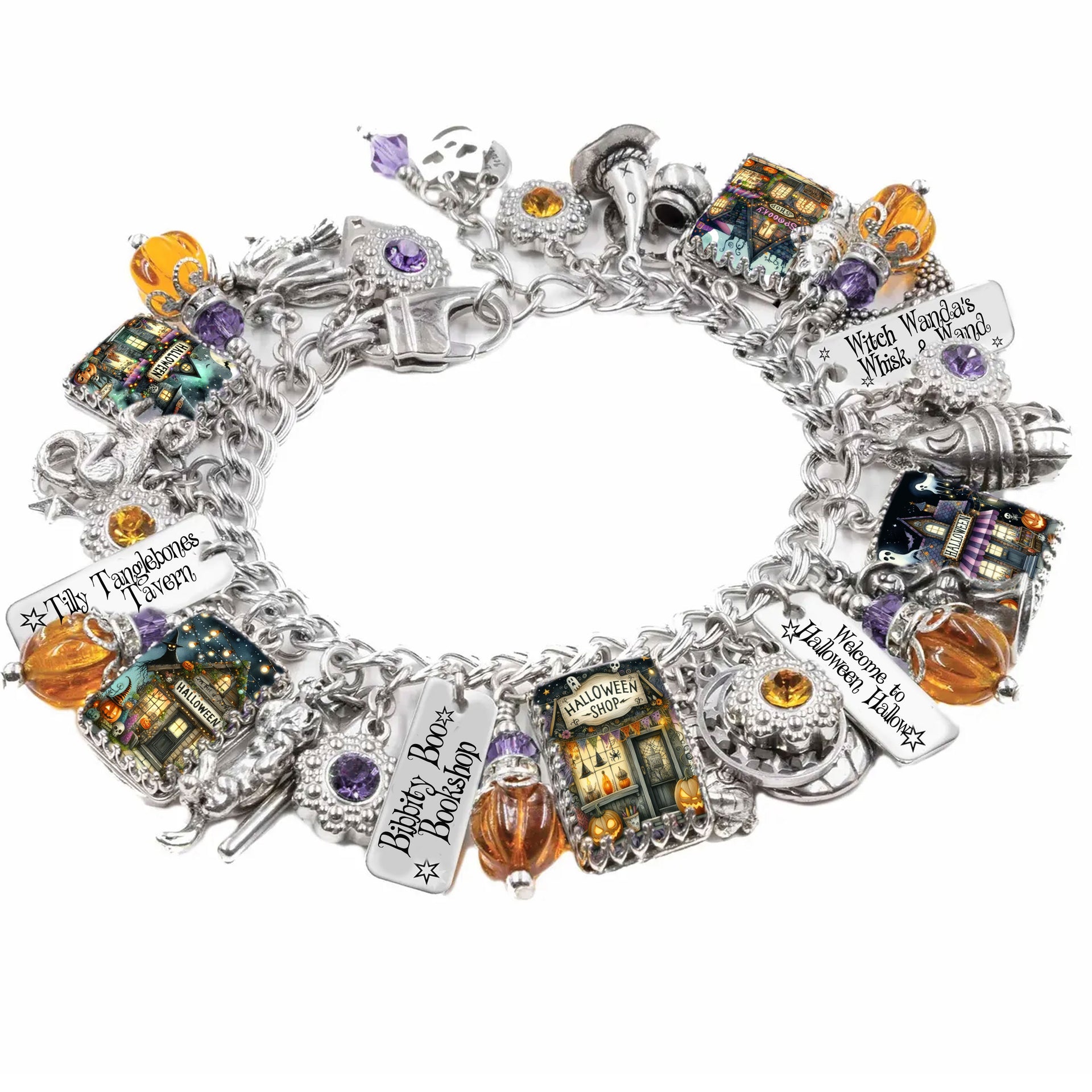Halloween village charm bracelet with illustrated shop charms, crystal pumpkins, dusty purple crystals, and whimsical silver Halloween icons.