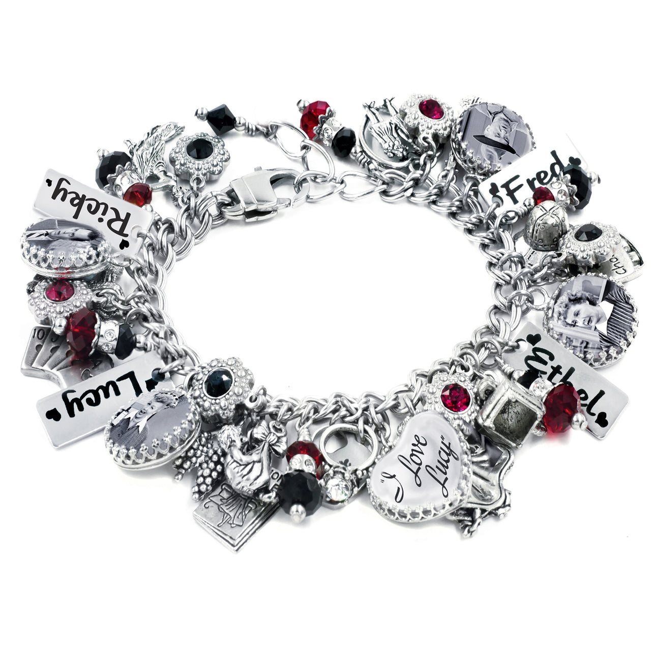 Handcrafted silver charm bracelet inspired by I Love Lucy, featuring black-and-white photo charms of Lucy, Ricky, Fred, and Ethel. Includes engraved name tags, a heart charm reading ‘I Love Lucy’, and vintage television-themed charms. Embellished with red, black, and clear Austrian crystals. Displayed on a white background.