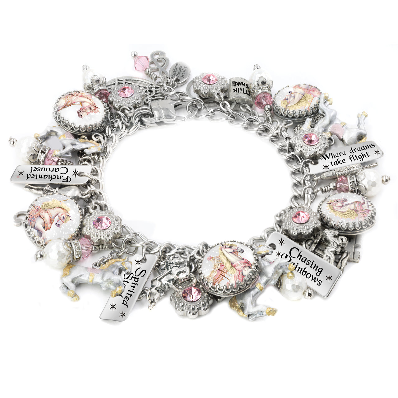 Silver charm bracelet featuring vintage-style pastel carousel horses, sparkling pink crystals, enamel horse charms, and engraved tags with whimsical sayings like “Enchanted Carousel” and “Chasing Rainbows,” displayed on a white background.