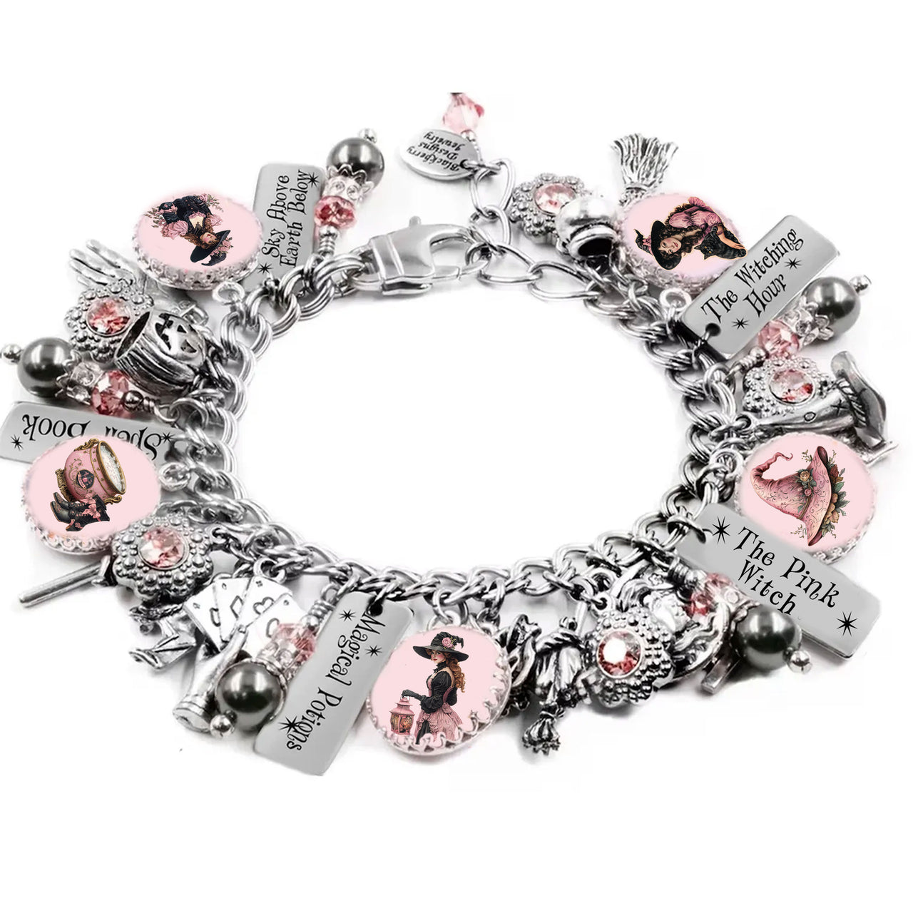 Retro Halloween charm bracelet in pink and black with 1940s-style witch images, 14 silver Halloween charms, and sparkling rose pink crystals.