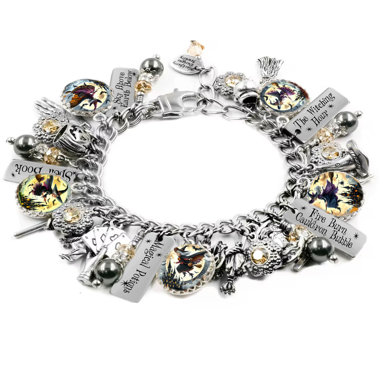 Halloween charm bracelet with flying witch charms, spell books, and black pearls
