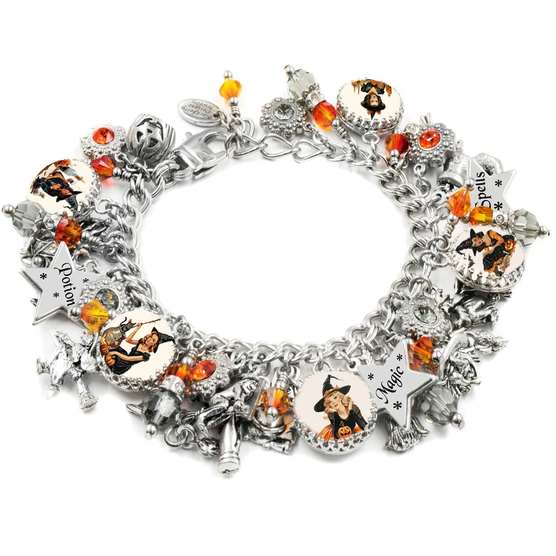 Retro Halloween charm bracelet with orange crystals, vintage pin-up witches in orange and black outfits, and silver engraved star charms.