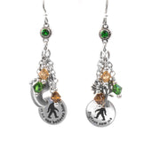 Bigfoot earrings in silver featuring forest monster silhouettes and engraved charms