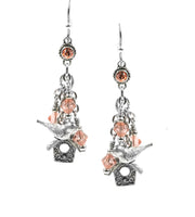 3rd day of christmas earrings on white background