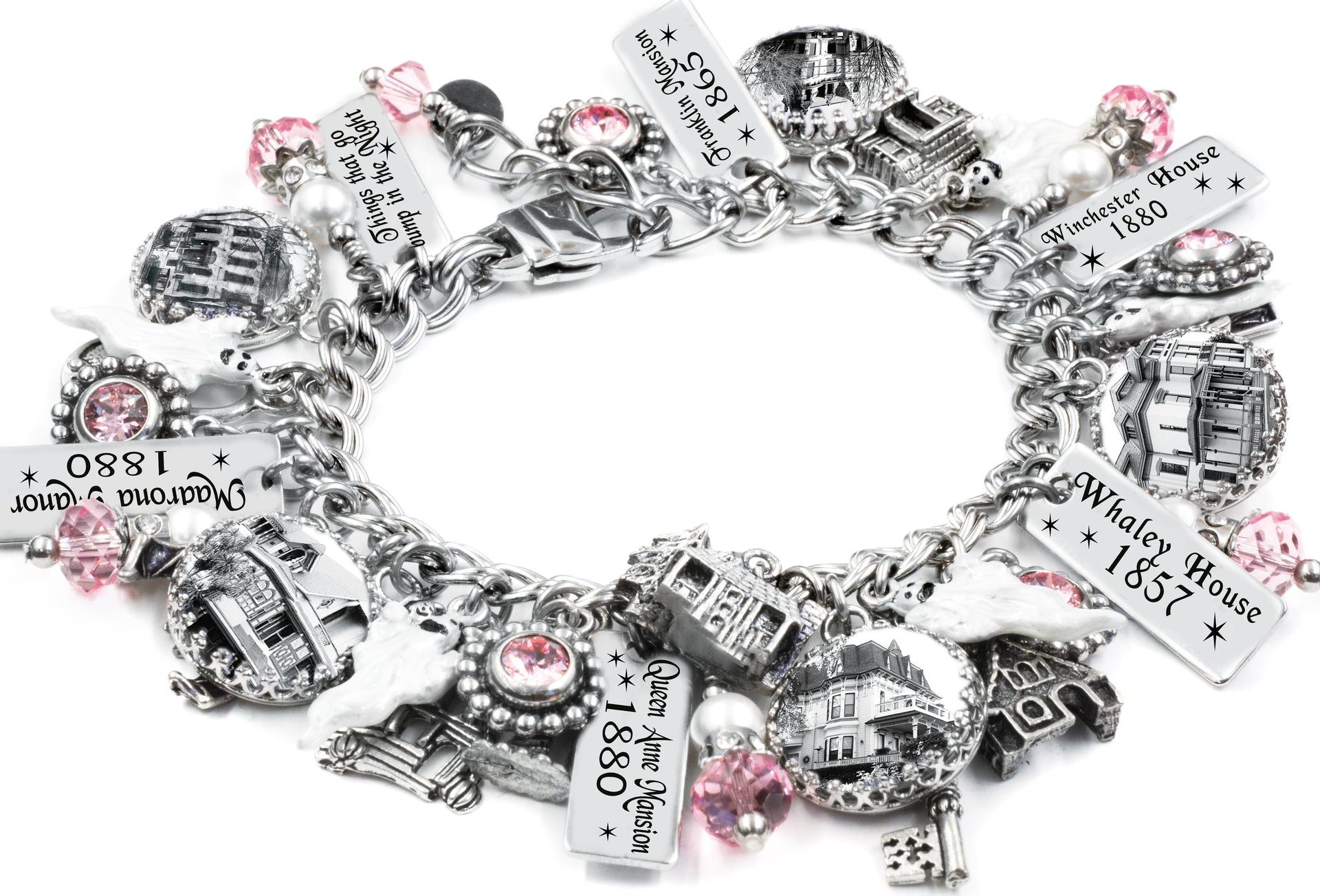 Spooky charm bracelet featuring haunted house and pumpkin