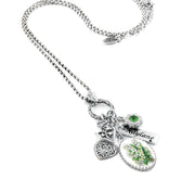 wide view of may birth flower necklace