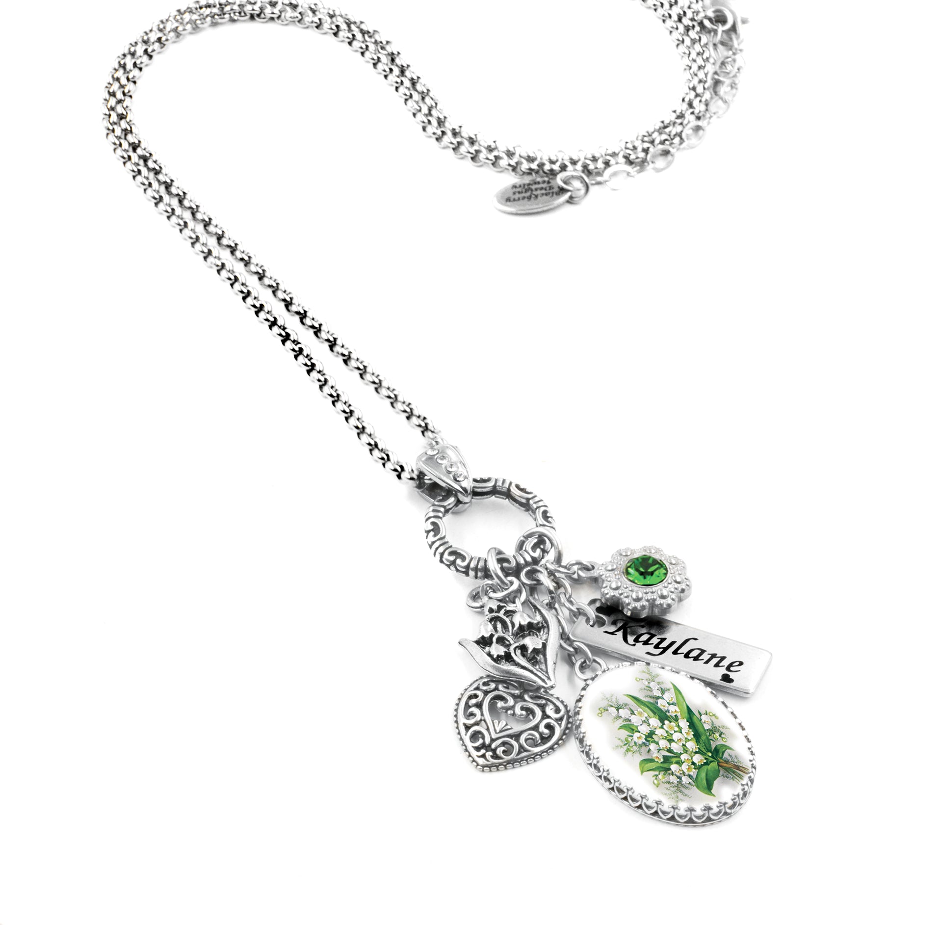 wide view of may birth flower necklace