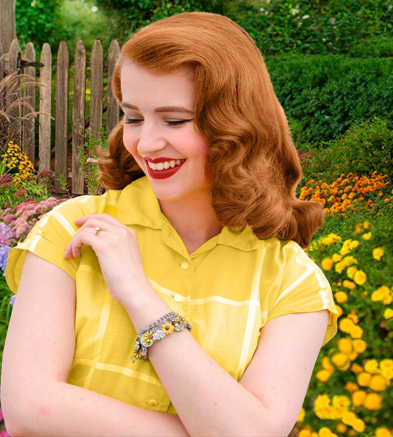 woman wearing sunflower jewelry - charm bracelet