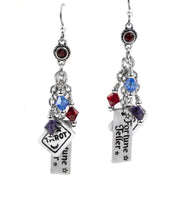 closeup of tarot card earrings