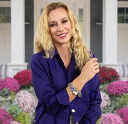woman in purple wearing wiccan/pagan charm bracelet