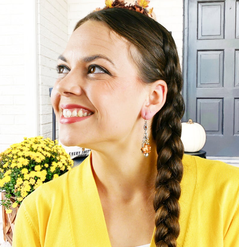 woman wearing fall earrings