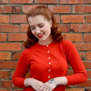 woman wearing ladybug bracelet