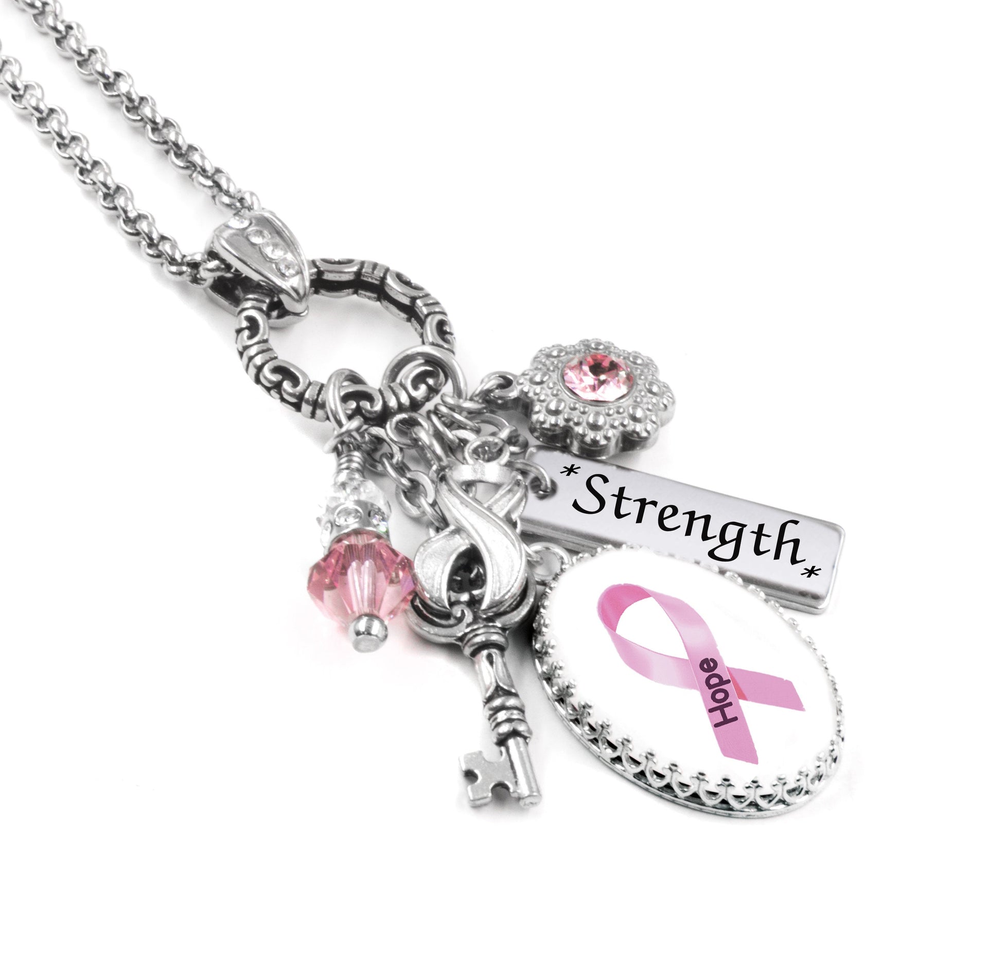 closeup of breast cancer jewelry