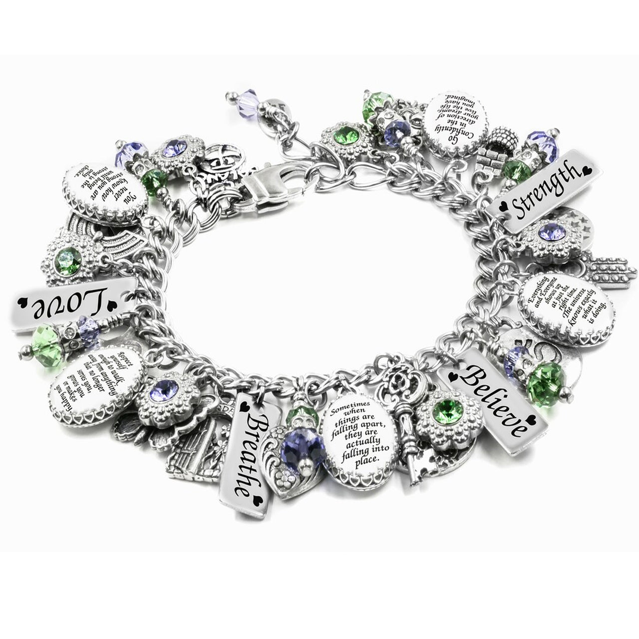A silver-toned charm bracelet adorned with various charms, including pendants, beads, and engraved text.