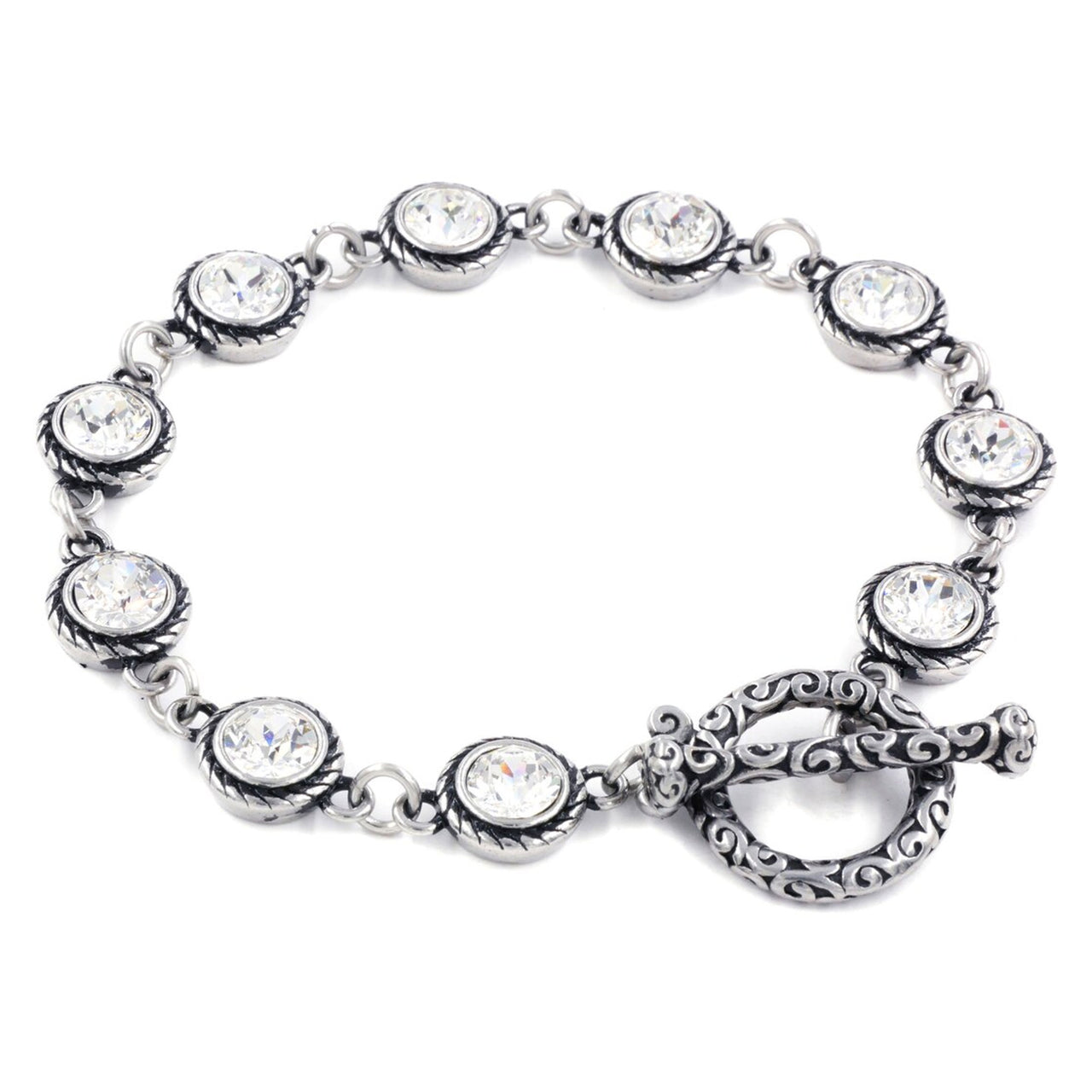 A silver bracelet with a clasp and a row of clear rhinestone stones.