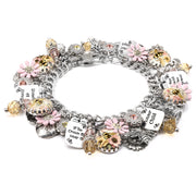 A bracelet adorned with various charms, including flowers, bees, and other decorative elements, as well as small charms with text.