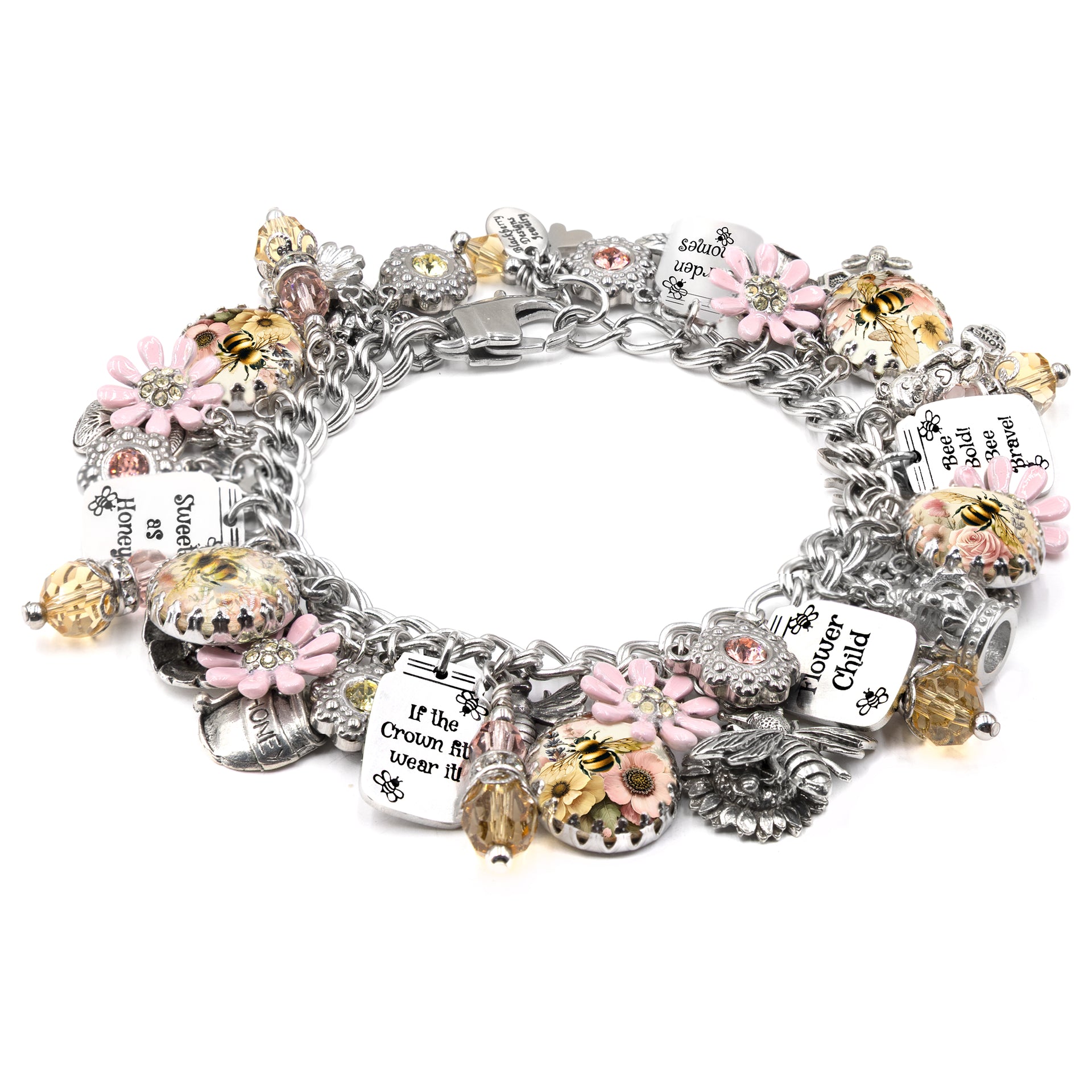 A bracelet adorned with various charms, including flowers, bees, and other decorative elements, as well as small charms with text.