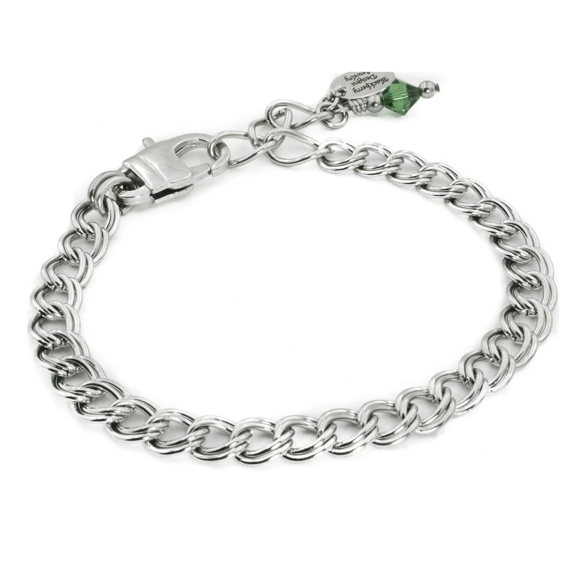 A silver-colored bracelet with a clasp and charm attached to it.