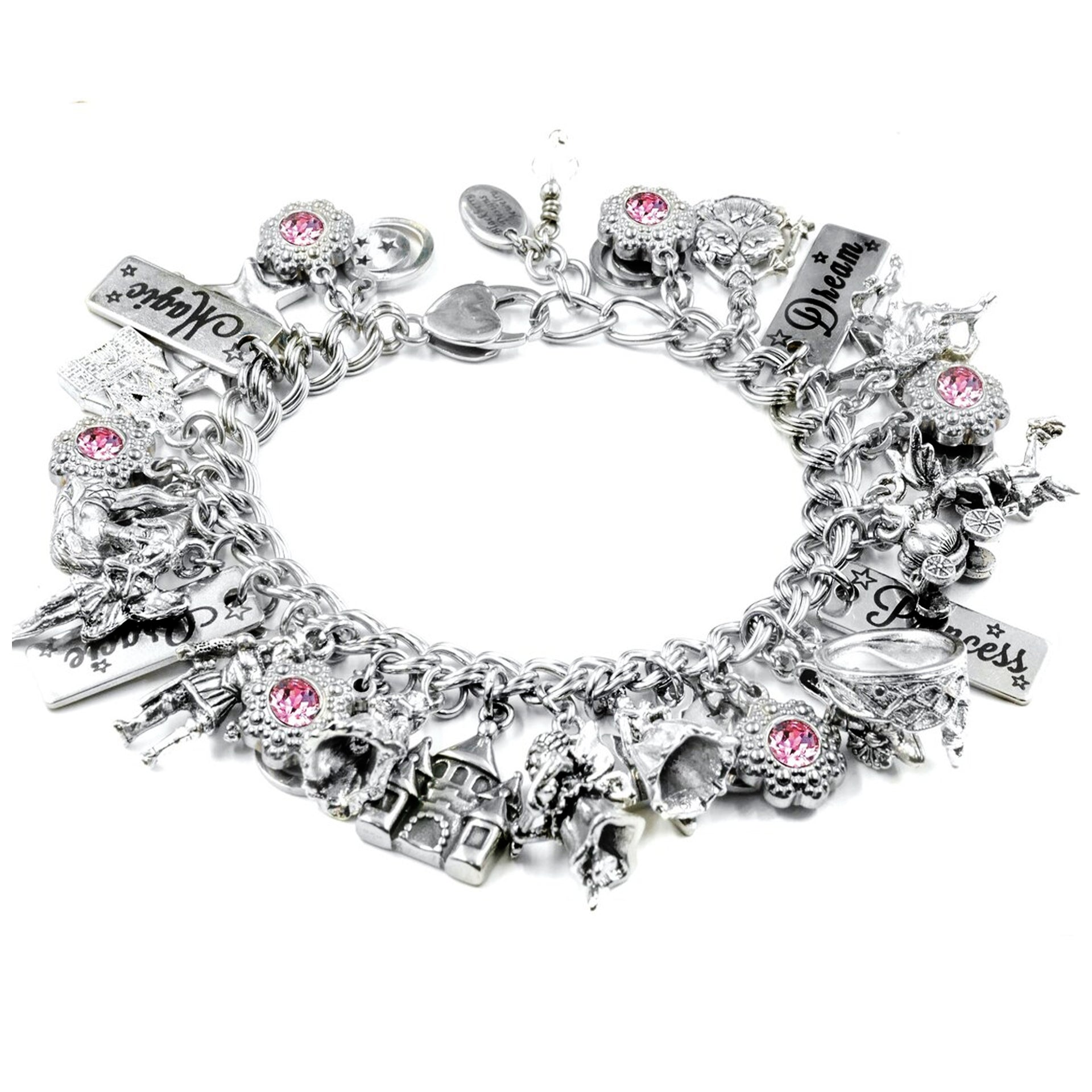 A silver charm bracelet adorned with various charms, including a castle, flowers, and a heart-shaped charm.