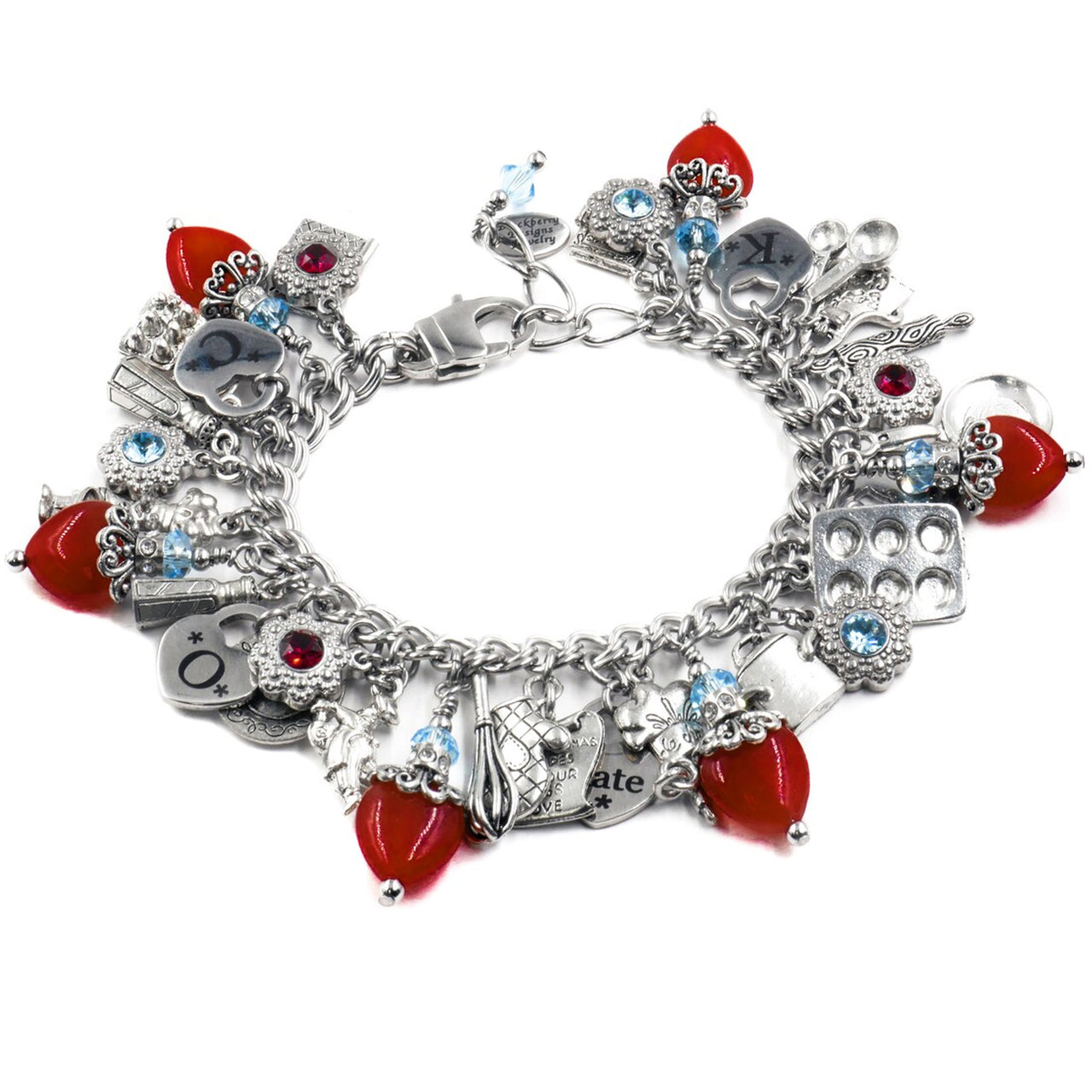 A silver and red charm bracelet with various charms, including a skull, heart, and other decorative elements, as well as red gemstones.