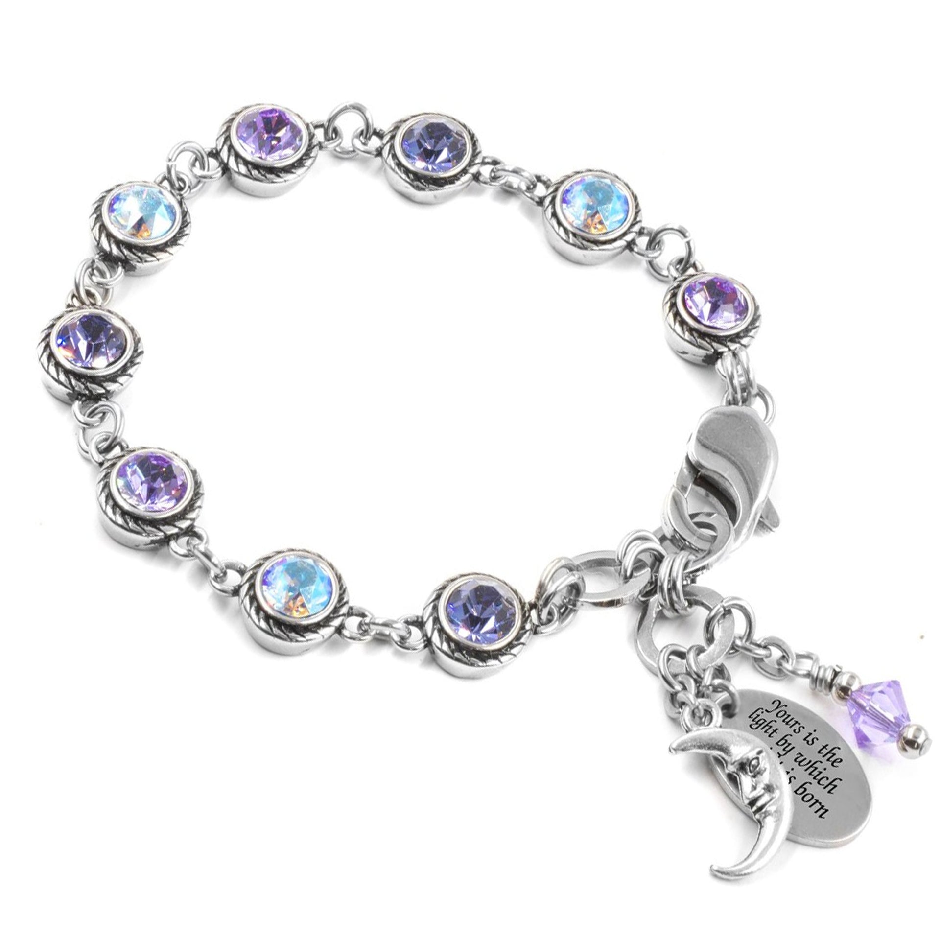 A silver bracelet with a charm and a charm bracelet with various gemstones.