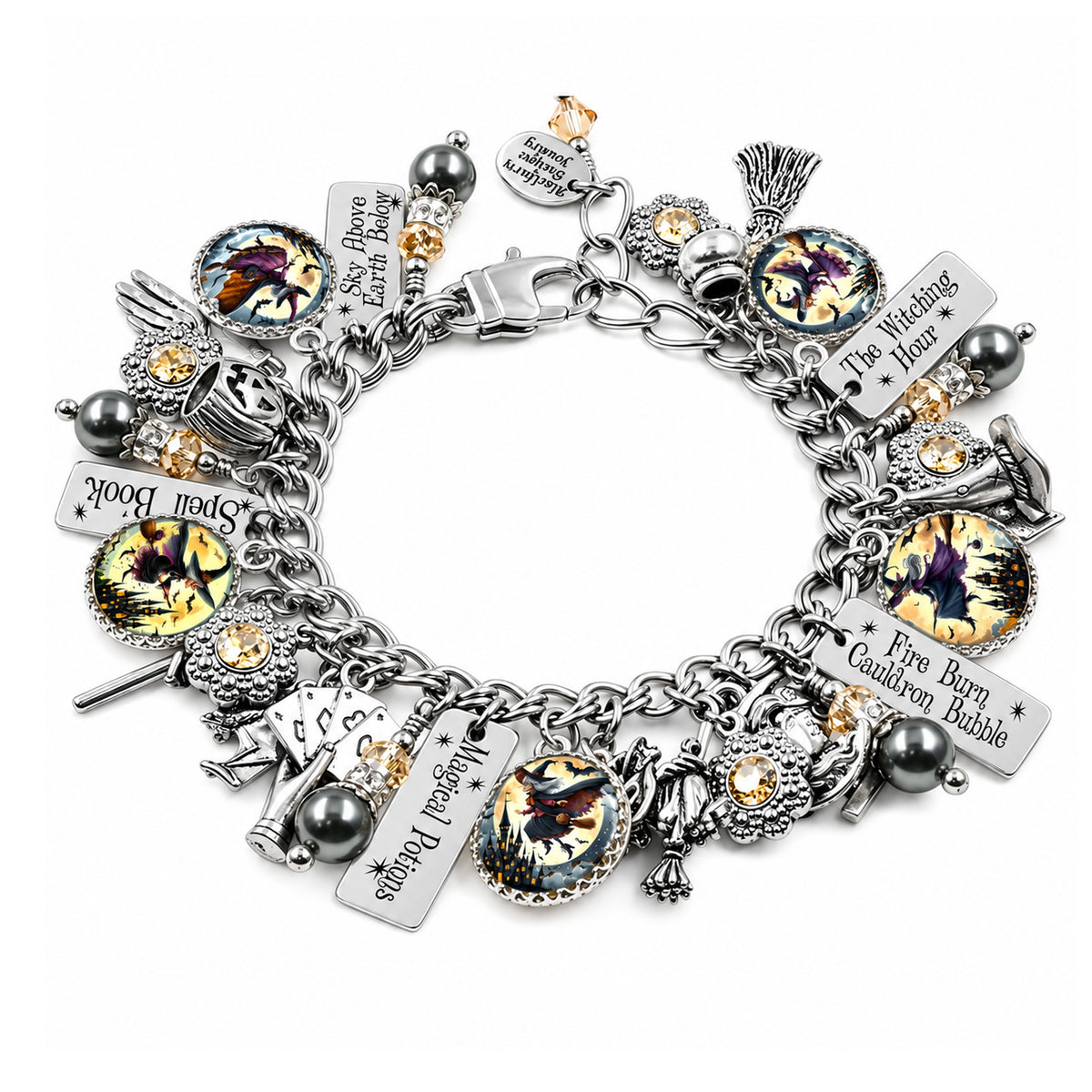 A silver charm bracelet featuring various gothic and fantasy-themed charms, including a broom, skull, dagger, and text plaques, displayed on a clean white background.