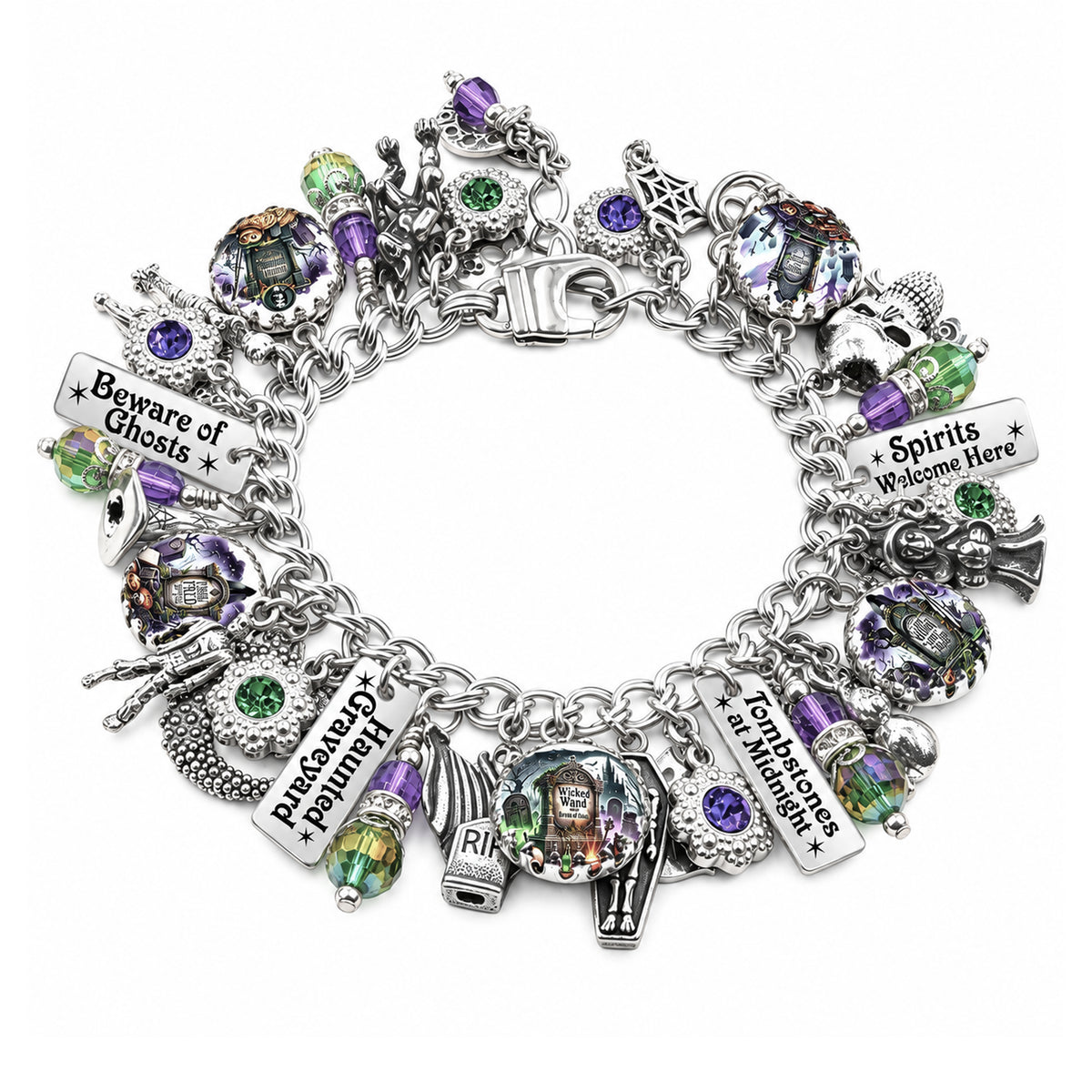 A silver charm bracelet featuring various Halloween-themed charms, including a coffin, skeleton, spider, and text charms reading 'Beware of Ghosts', 'Spirits Welcome Here', with lots of graveyard whimisical and witchy charms. The bracelet is decorated with purple and green rhinestones and is shown on a plain white background.
