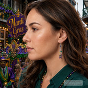 A woman in profile wearing a dangling Mardi Gras beaded earring, with a festive Mardi Gras parade background and a watermark indicating it is displayed on AModel.