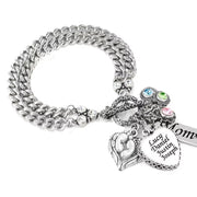 Silver bracelet with charms on a white background