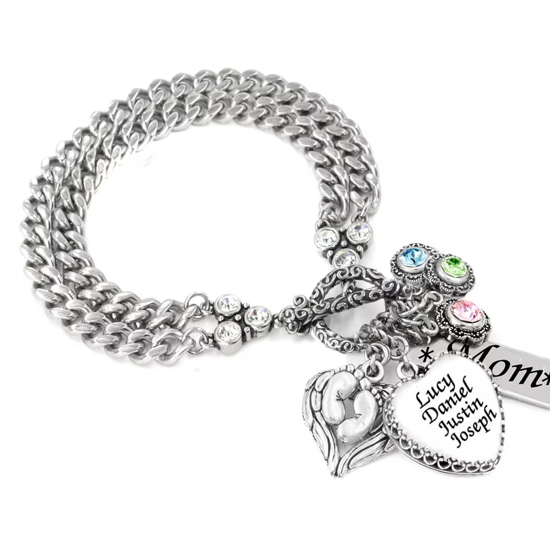 Silver bracelet with charms on a white background