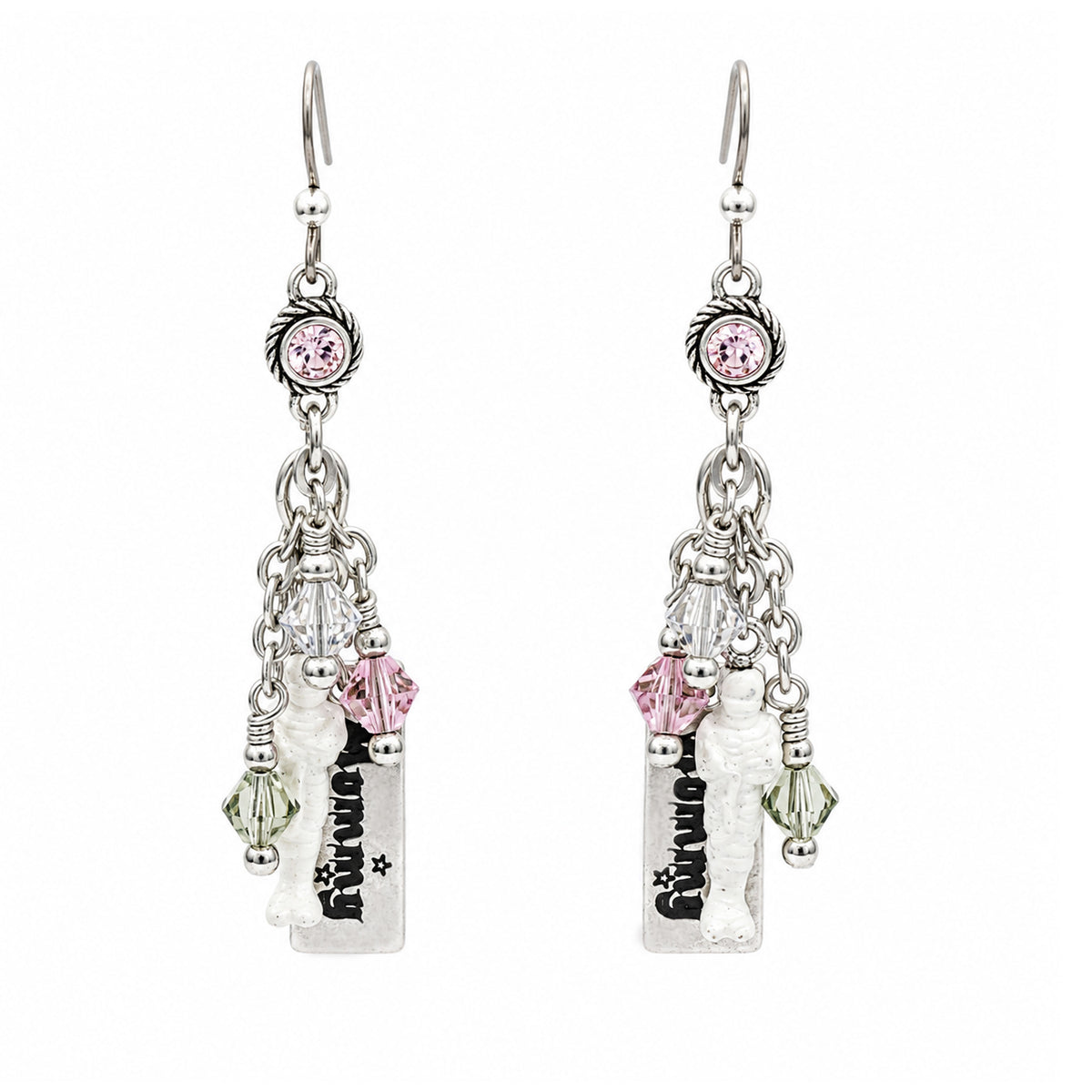 A pair of mummy silver dangle earrings with pink and aurora crystal charms, featuring a small hanging white mummy with black text, shown against a plain white background.
