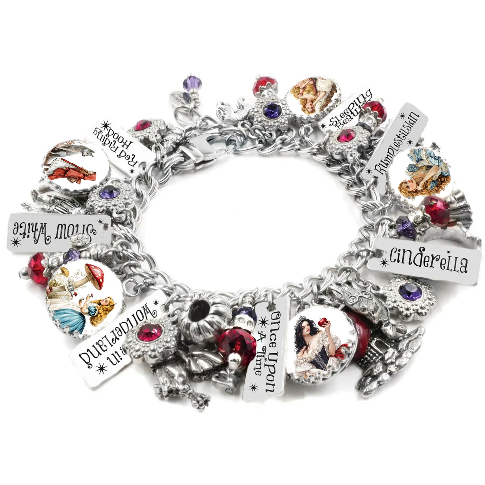 Handcrafted silver charm bracelet inspired by classic fairy tales, featuring charms for Cinderella, Snow White, Red Riding Hood, Sleeping Beauty, and Rumpelstiltskin. Includes vintage-style storybook artwork under glass cabochons, engraved tags with character names and phrases like ‘Once Upon a Time’ and ‘In Wonderland’. Accented with red, purple, and pink Austrian crystals. Displayed on a white background.