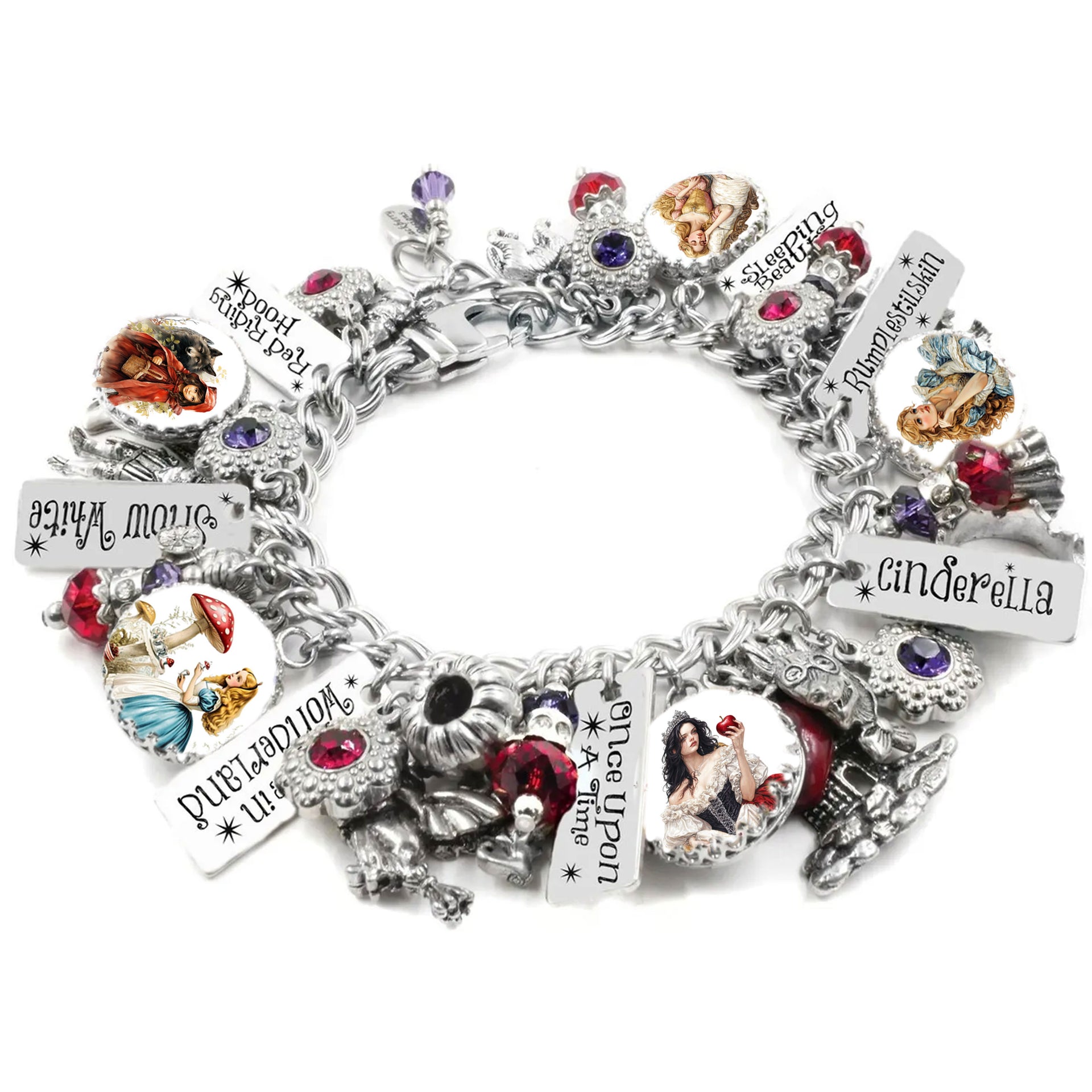 Handcrafted silver charm bracelet inspired by classic fairy tales, featuring charms for Cinderella, Snow White, Red Riding Hood, Sleeping Beauty, and Rumpelstiltskin. Includes vintage-style storybook artwork under glass cabochons, engraved tags with character names and phrases like ‘Once Upon a Time’ and ‘In Wonderland’. Accented with red, purple, and pink Austrian crystals. Displayed on a white background.