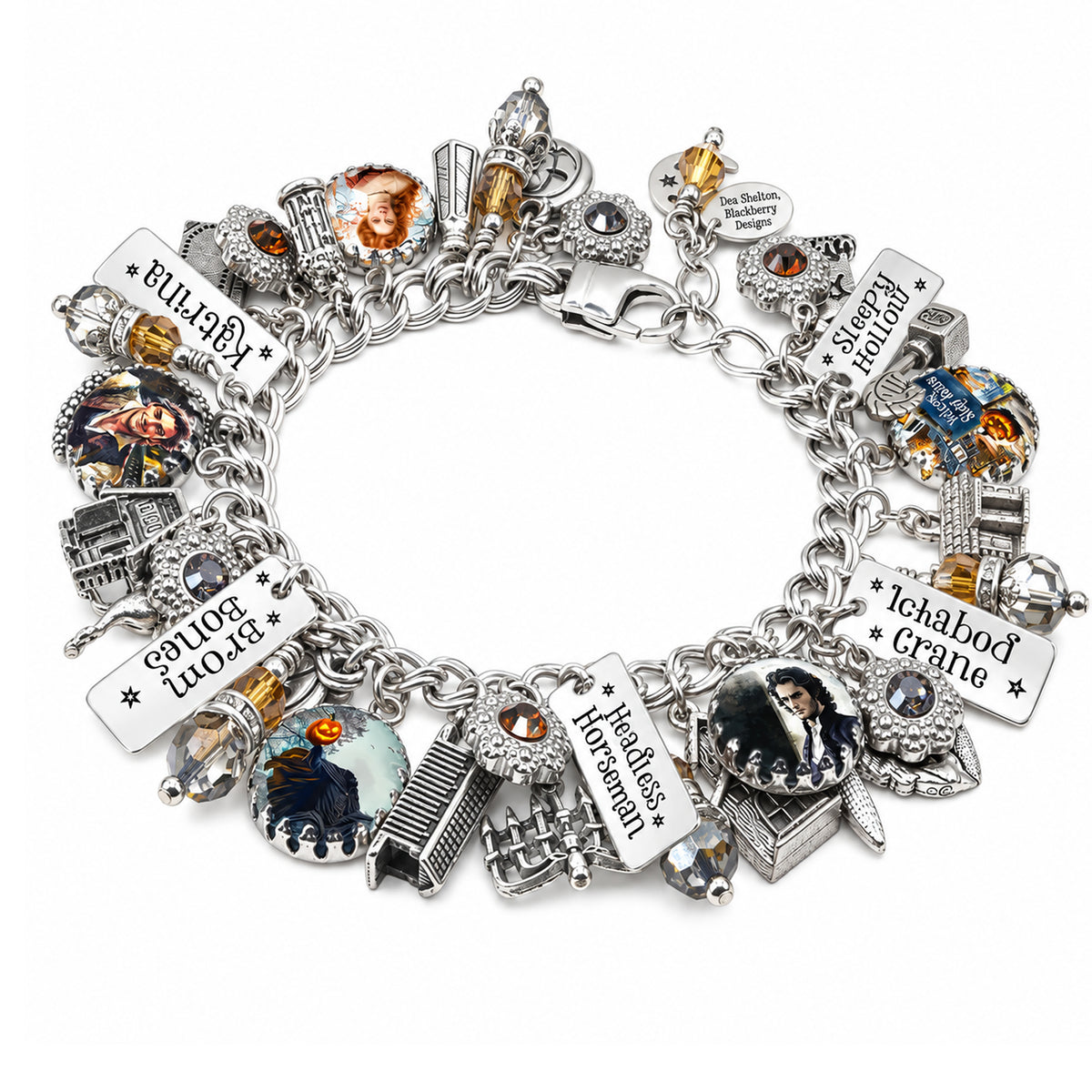 A silver charm bracelet featuring multiple themed charms inspired by 'sleepy hollow' with brom bones, katrina, and the headless horseman.  silver charms from the horse, pumpkin, bridge, school house, and salt. 