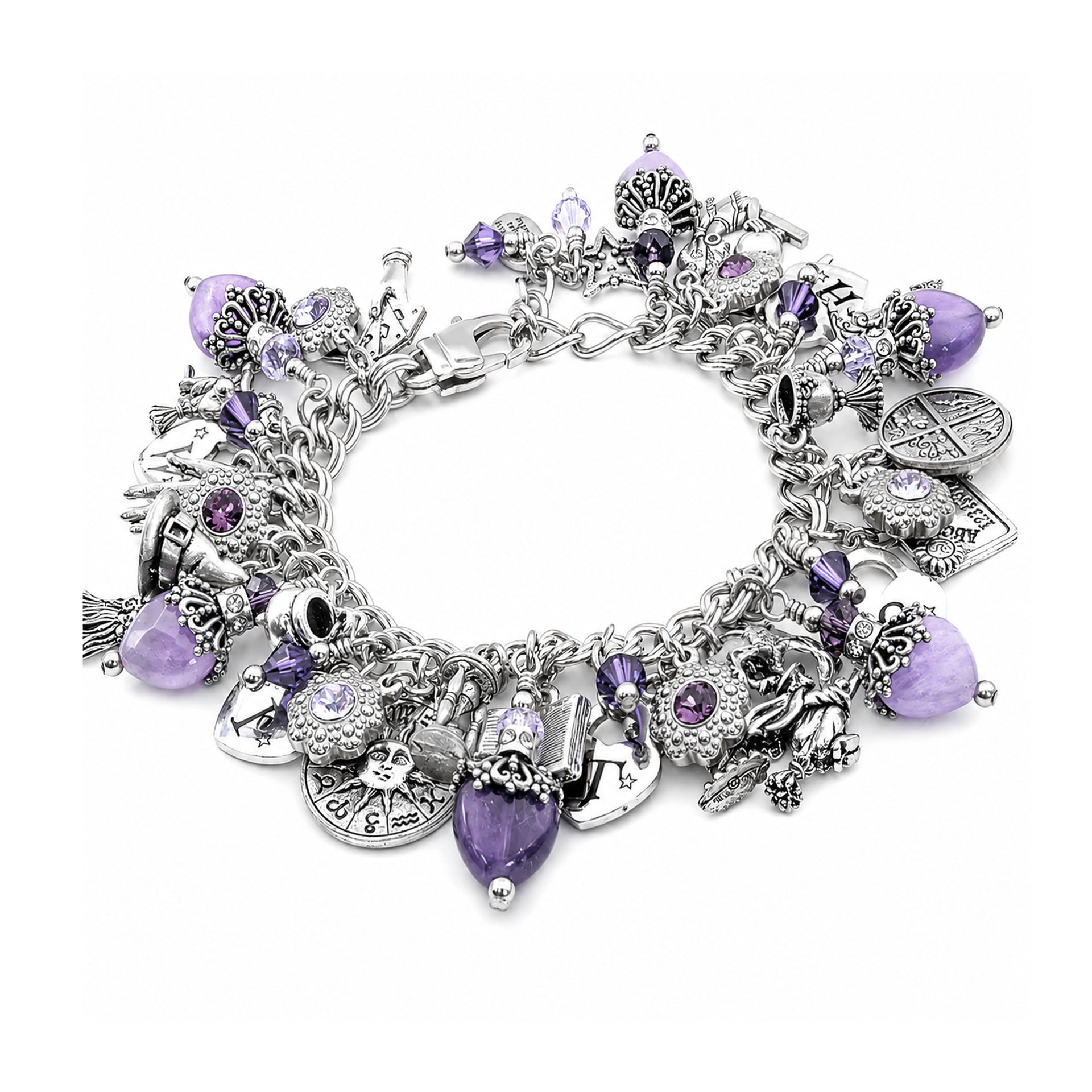 A silver charm bracelet featuring various gothic and occult-themed charms, including a skull, crossbones, pentacle, and key, embellished with purple faceted gemstones, set against a plain white background.