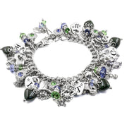 A silver-toned charm bracelet adorned with various charms, including gemstones, and a clasp.