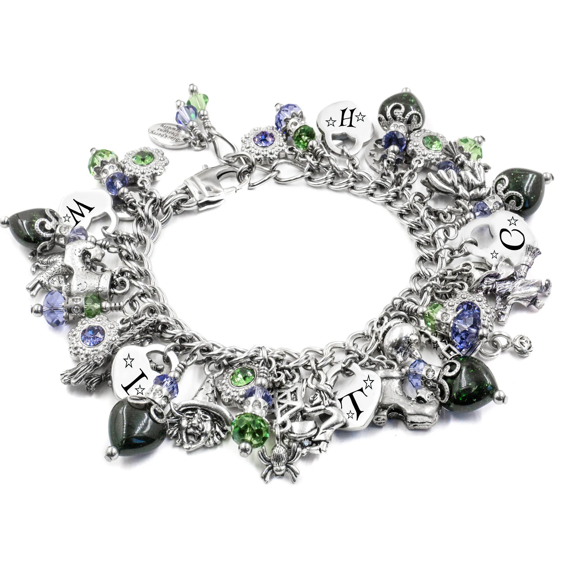 A silver-toned charm bracelet adorned with various charms, including gemstones, and a clasp.