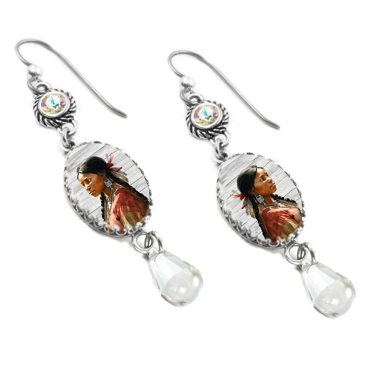 Silver dangle earrings inspired by Native American heritage, featuring tribal-style artwork under glass cabochons, white pearls, turquoise-blue Austrian crystals, and stainless steel ear wires. Lightweight and displayed on a white background.
