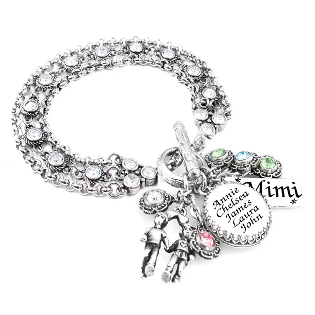 A silver-toned bracelet with a charm and a pendant, featuring a nameplate with the names 'Annie', 'Chelsea', 'James', 'Laurie', and 'John'.