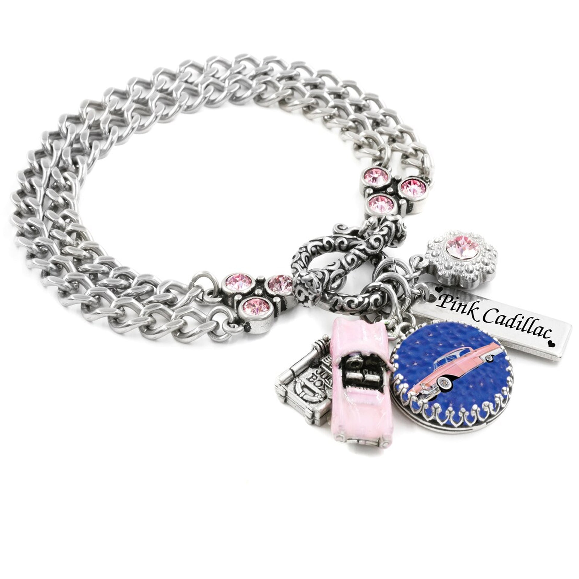 A silver bracelet with various charms and charms attached to it.