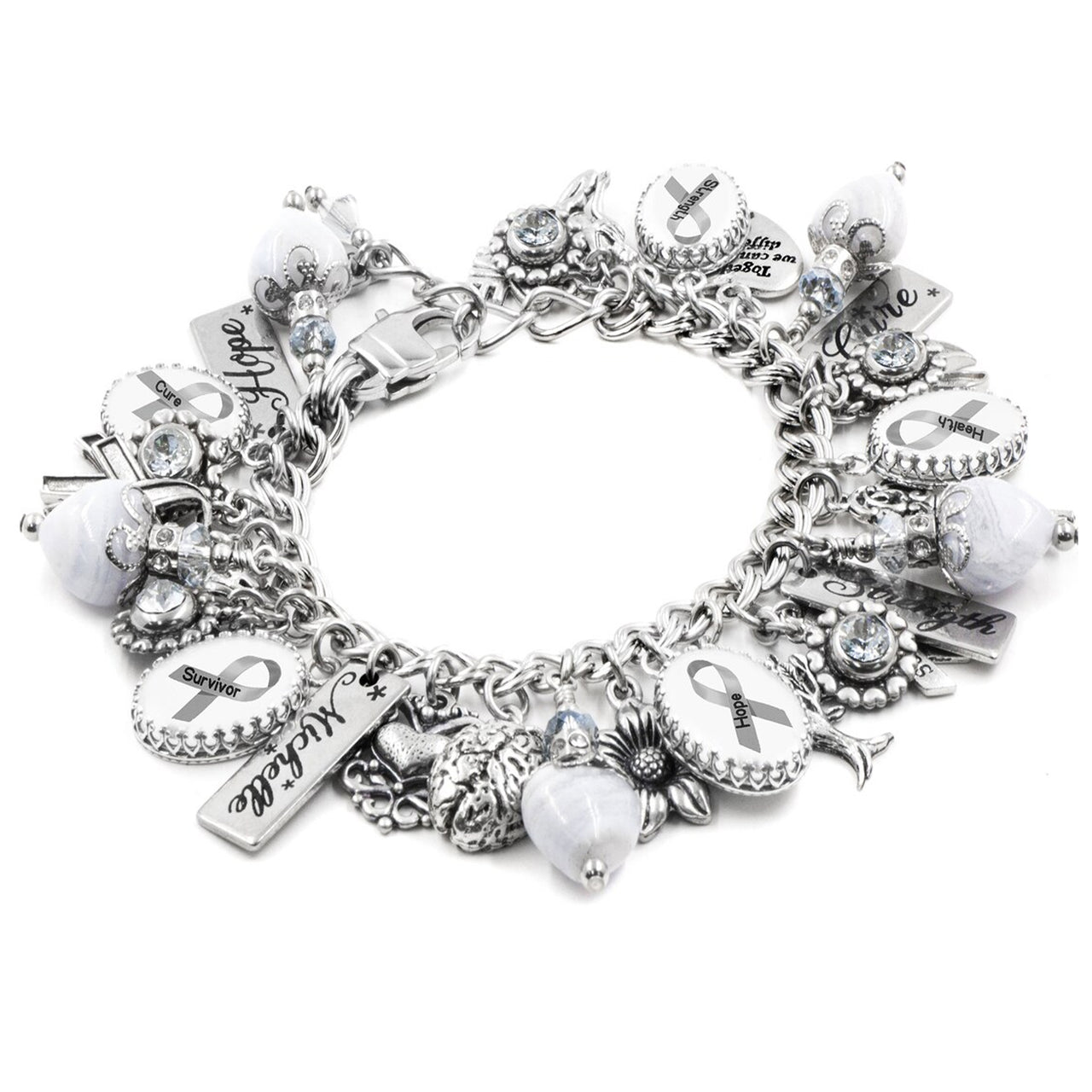 A silver-toned charm bracelet adorned with various charms, including a ribbon, flowers, and other decorative elements.