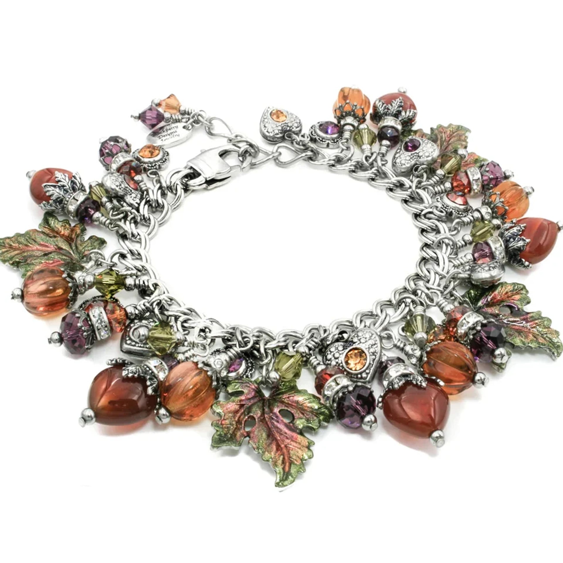 a bracelet with charms and leaves on it