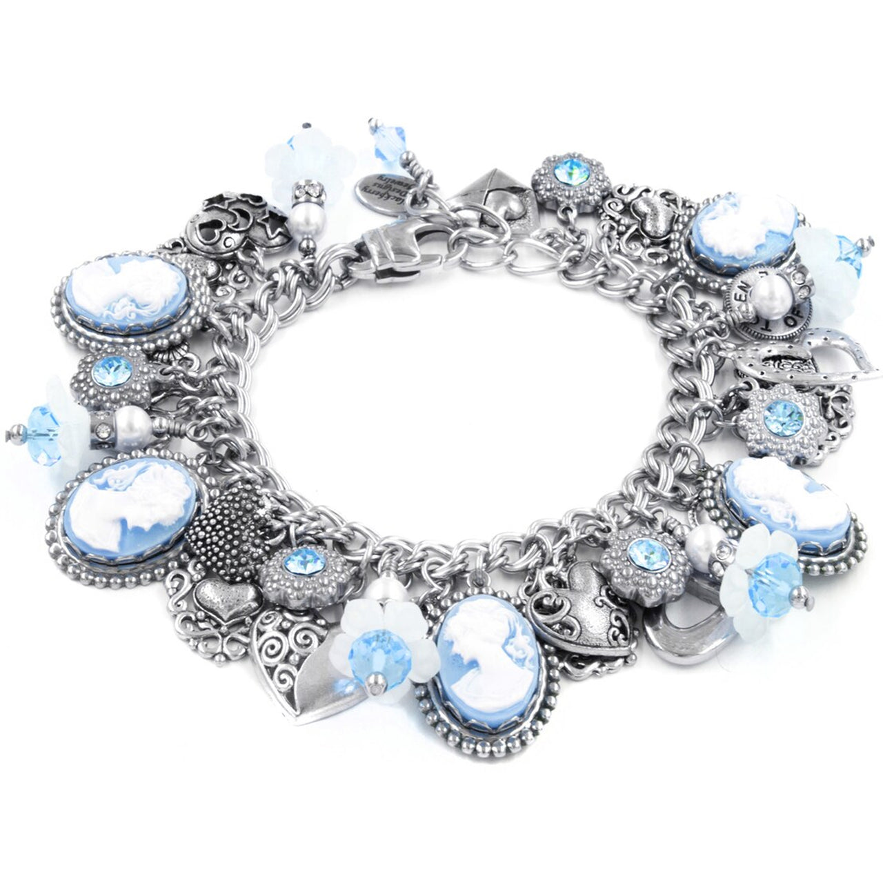 A silver and blue charm bracelet with various decorative elements such as beads, charms, and pendants.