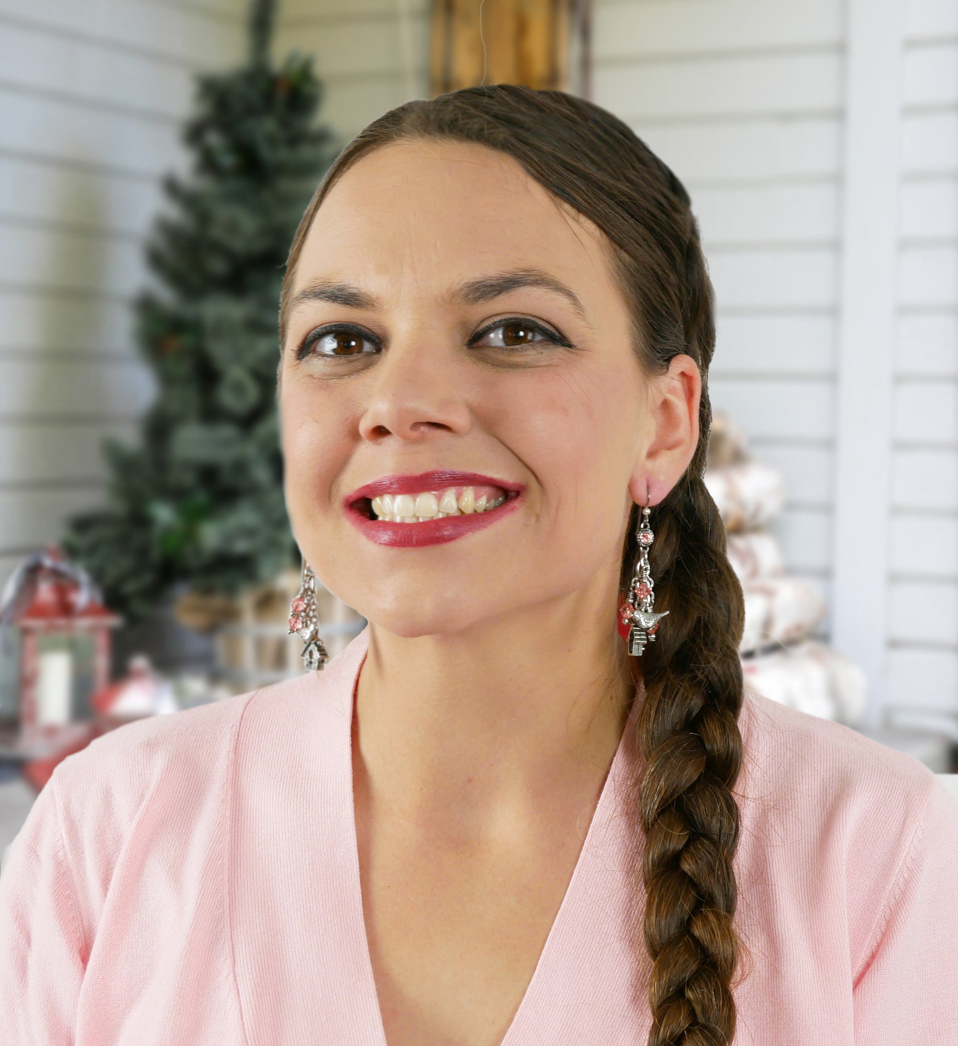 woman wearing 3rd day of christmas earrings