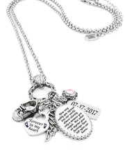 closeup of child loss charm necklace
